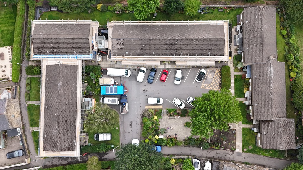 Aerial view of the Allen Croft scheme before the works started, showing several blocks of flats, parking areas and gardens