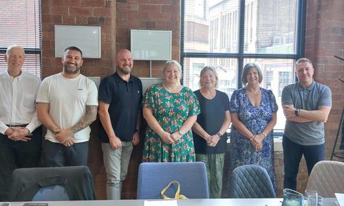 The Review Crew stood together