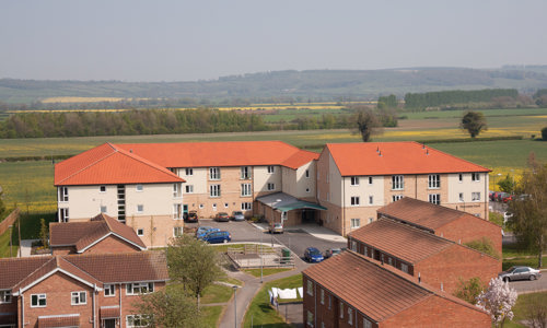 A photograph of a few different houses and flats