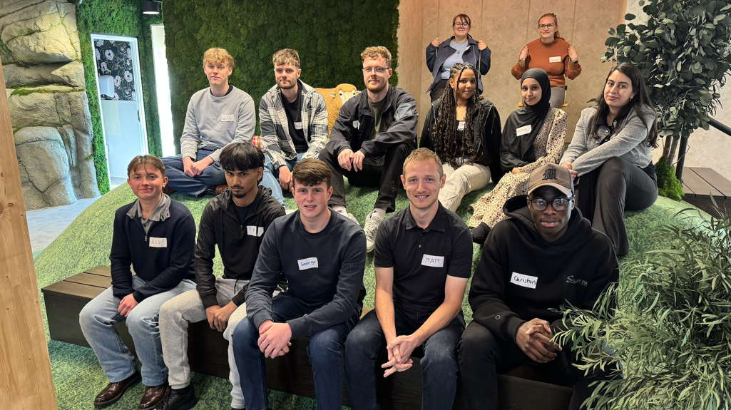 Apprentices who joined us in 2025 sat on the grass verge at The Place