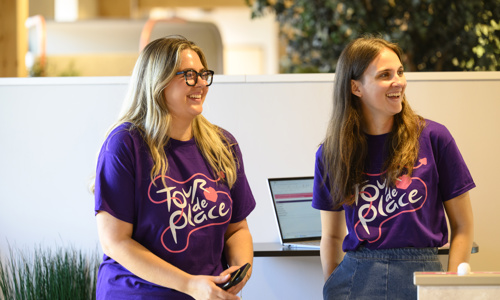 Two colleagues laughing